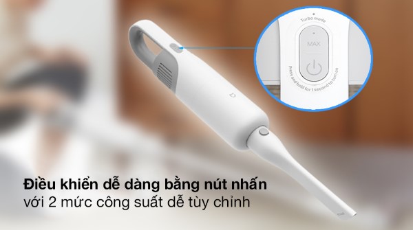 Nhấn và giữ nút nguồn ở vị trí trên thân máy.